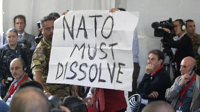 NATO-Exit under Art. 13: Dismantle NATO, Close Down 800 US Military Bases, Prosecute the War Criminals